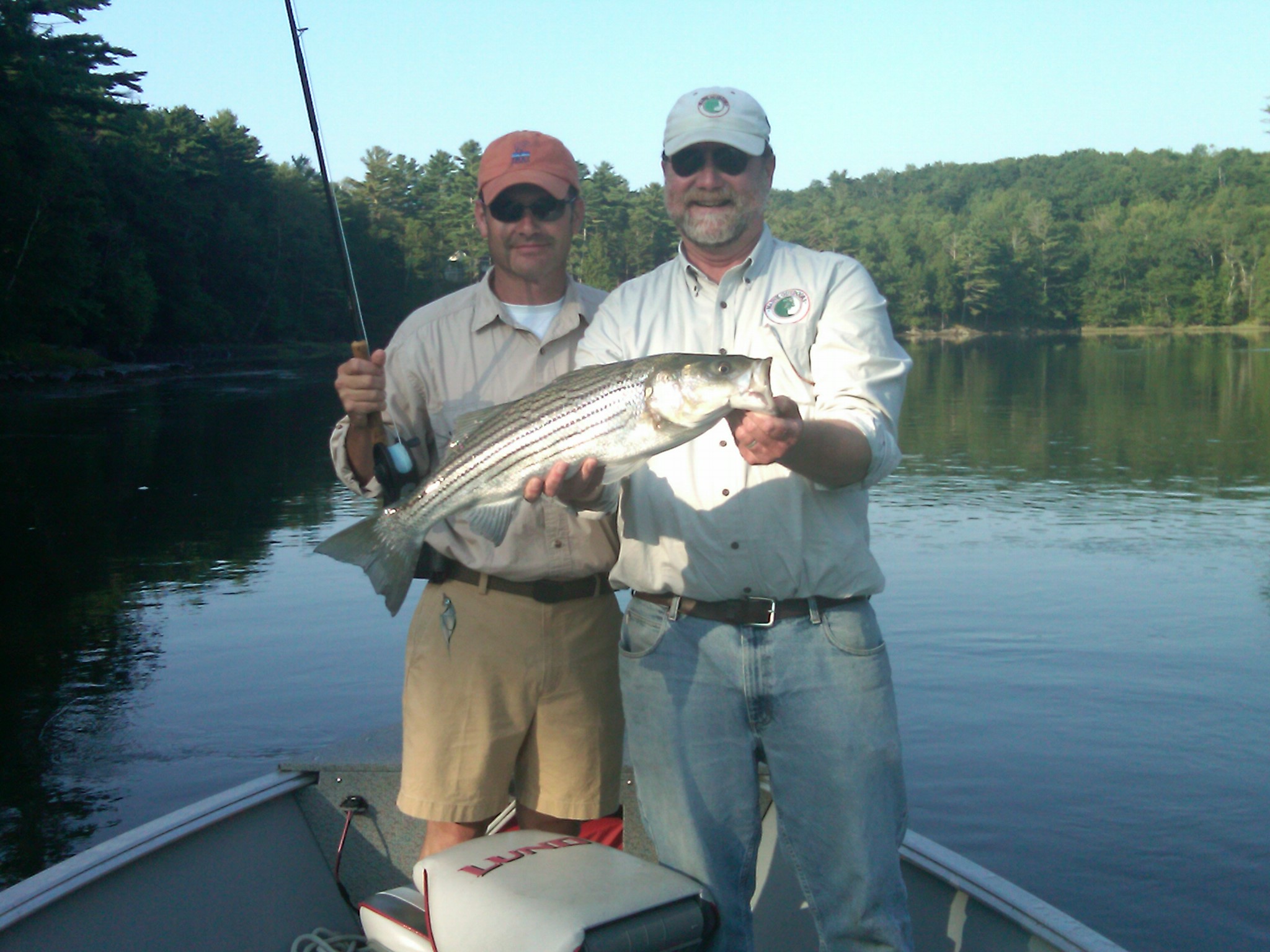 John and Don with a striper caught on a fly